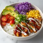 viral honey BBQ chicken bowl with rice avocado and vegetables